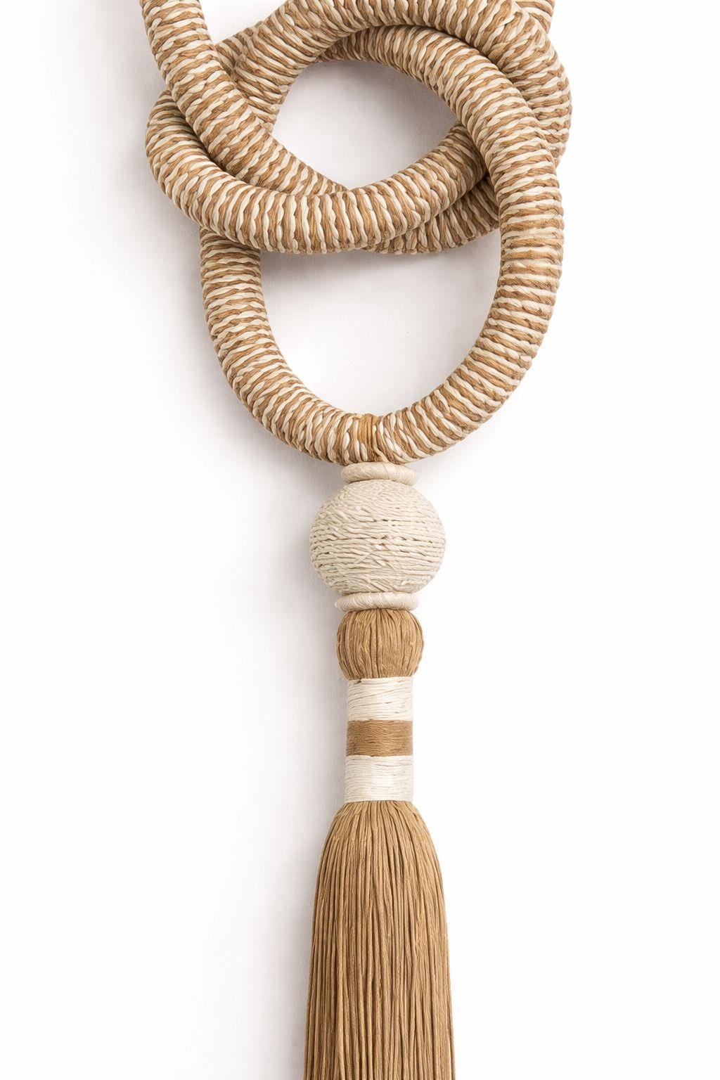 Escultura têxtil versátil